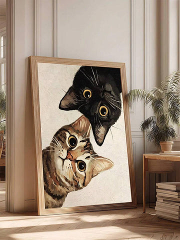 Whimsical framed animal print showing two curious cats peeking into frame with large eyes