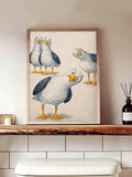 Cartoon seagull framed print above bathroom vanity