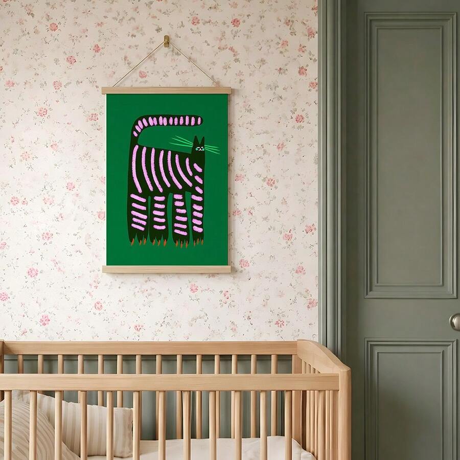 Hanging cat poster with pink striped black cat over nursery crib