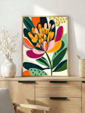Colorful botanical poster featuring lotus like bloom with teal navy pink and cream tones