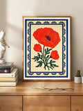 Framed flower print showing abstract tropical bloom in red orange yellow blue and green