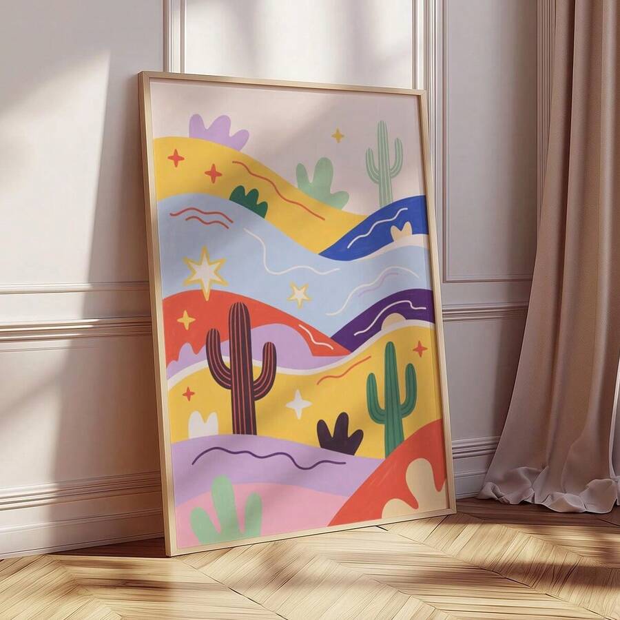 Bright abstract cactus print in wood frame leaning against wall