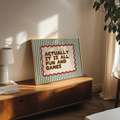 Fun and games canvas poster displayed in a warm dining room above a sideboard