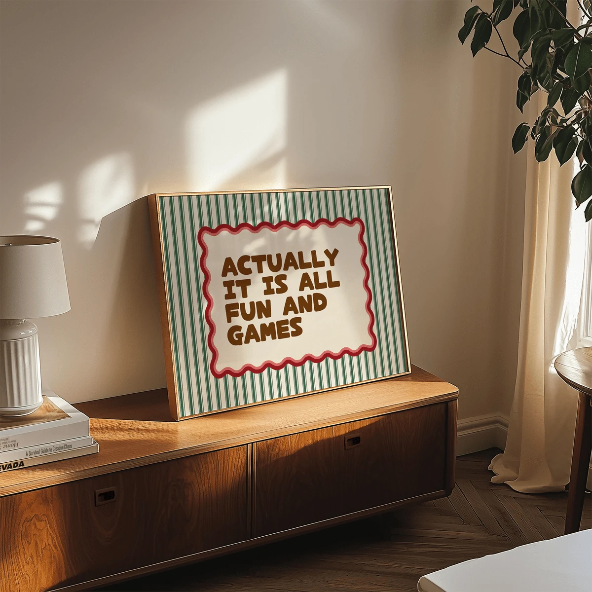 Fun and games canvas poster displayed in a warm dining room above a sideboard