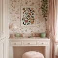 lifestyle wall display of Framed botanical wall art showing illustrated tree leaves as a labeled species guide with cream background, olive greens and vintage nature chart styling.
