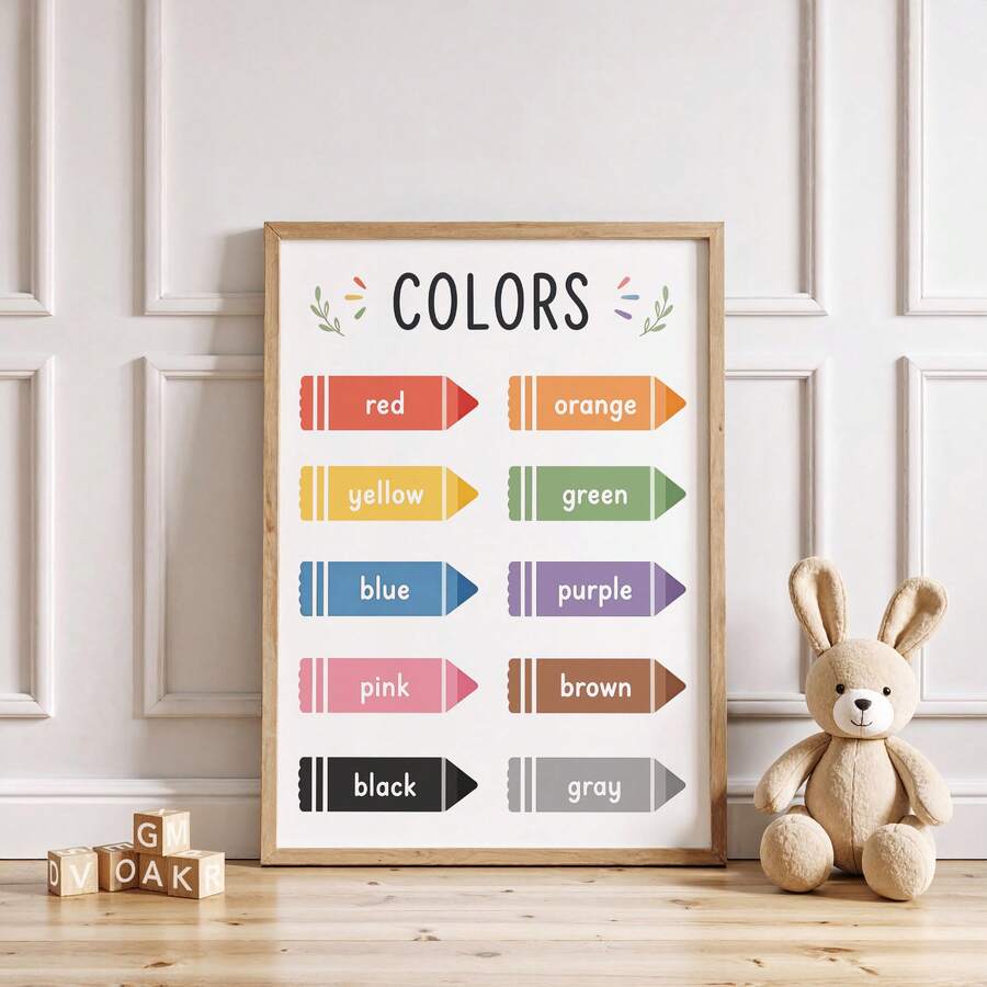 front framed view of Educational kids wall art showing a COLORS learning chart with labeled crayon icons in red, orange, yellow, green, blue, purple, pink, brown, black and gray.