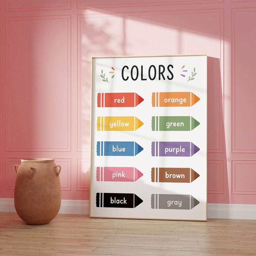 front framed view of Educational kids wall art showing a COLORS learning chart with labeled crayon icons in red, orange, yellow, green, blue, purple, pink, brown, black and gray.