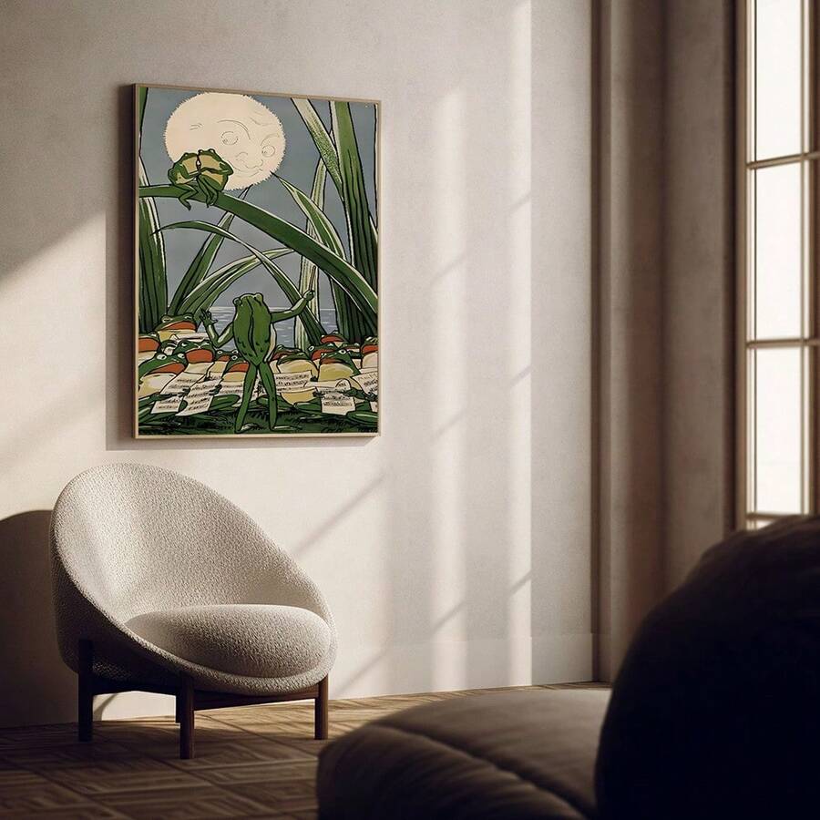 Framed frog choir poster above cream living room chair