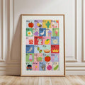 Alphabet wall art framed nursery poster leaning on floor with pastel A to Z illustrations