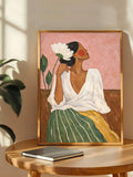 Emerald green canvas print shown with feminine portrait and boho color palette