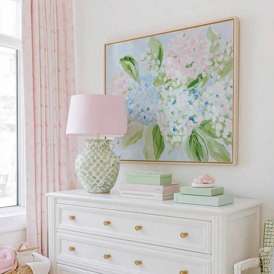 Pastel hydrangea canvas wall art displayed above a bedroom bed
