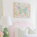 Framed pink blue butterfly wall art with soft floral background and white frame