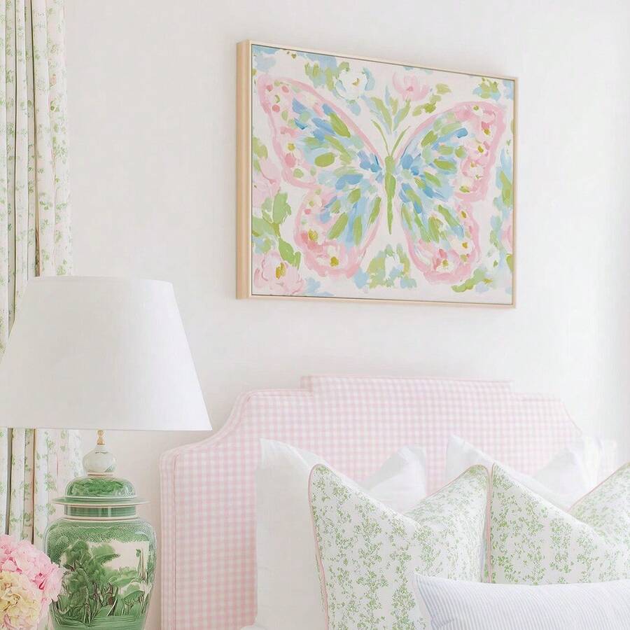 Framed pink blue butterfly wall art with soft floral background and white frame