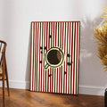 Coffee wall art with red striped background in bright reading corner