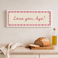 Whimsical typography canvas print with checker border