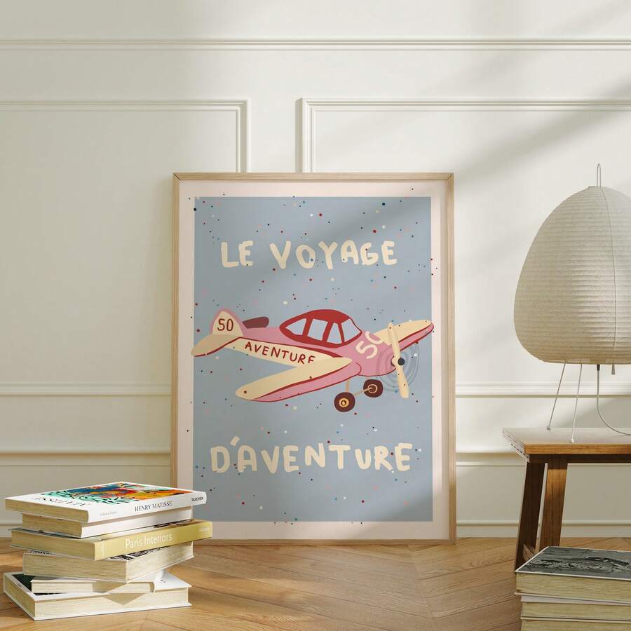 Vintage airplane wall art styled in a cozy living room with books and a lamp