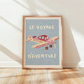 Pastel airplane canvas artwork shown on a sunlit white wall above a wood floor