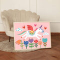 Pink unicorn poster shown with pastel nursery colors and slim pink frame