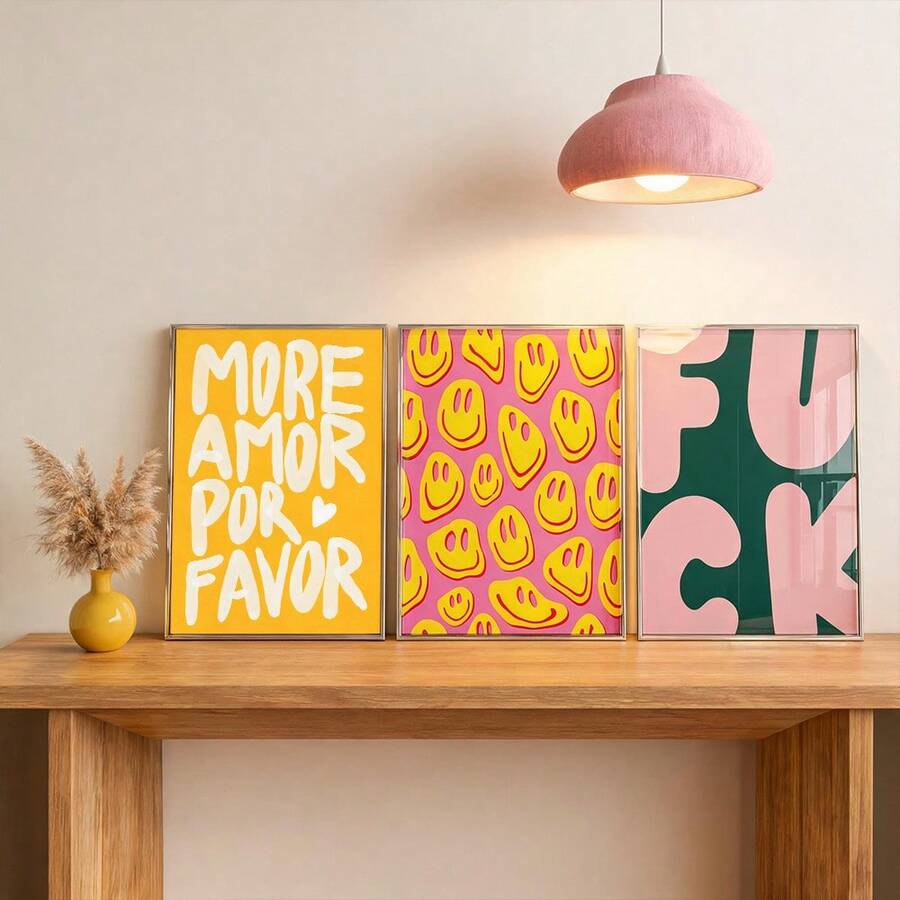 Framed pop art poster trio on table display