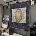 Orange red teal floral mandala tapestry on dark blue background behind bed