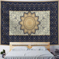 Boho floral mandala wall hanging styled behind black lounge seating