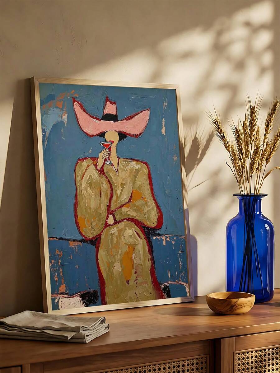 Bold framed abstract western cowgirl wall art with cowboy hat boots and bright red pink orange tones