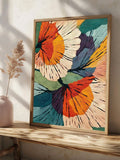 Vibrant mid-century botanical canvas leaning on a console table