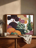 Dotted botanical garden wall art above a styled wooden sideboard
