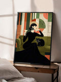 Cocktail-holding woman beside a black cat and green sofa in a black-framed geometric bedroom display