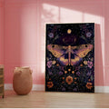 Celestial moth and moon botanical wall art in pink paneled interior