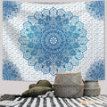 Boho mandala wall hanging displayed above bed as dorm room decor