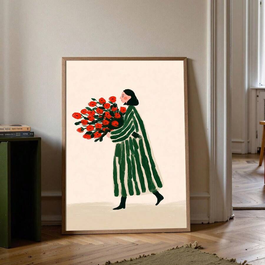 Framed illustration of woman in green striped coat carrying red flower bouquet on cream background
