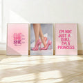 Three pink preppy quote canvas prints on floor