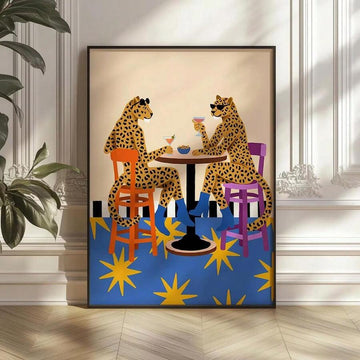Whimsical wall art of two spotted big cats drinking cocktails at bar table
