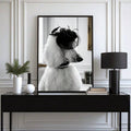 Black and white poodle portrait wearing black fascinator hat and pearl collar as framed chic dog wall art
