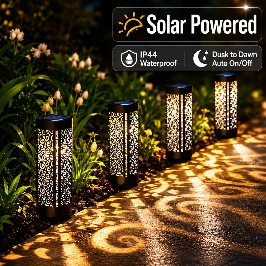 Solar path lights warm patterned glow along outdoor walkway with scroll cutout projection