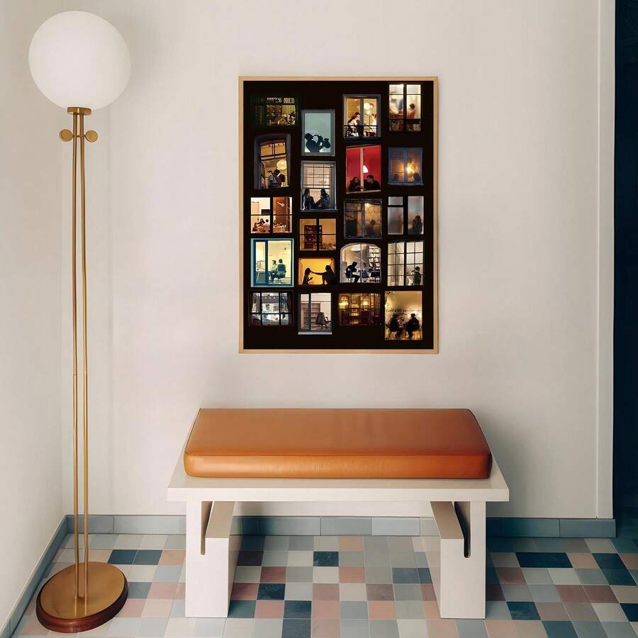 City wall art above bench with glowing apartment windows and warm night colors