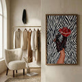Red cowboy hat and dark brown boot artwork on a black-and-white zebra ground