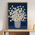 Daisy poster shelf display with white flowers yellow centers dotted vase and neutral decor