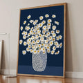 Floral wall art angled floor view showing wood frame depth navy blue background and daisies