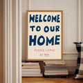 Welcome home please leave by 9 PM print displayed above a bed