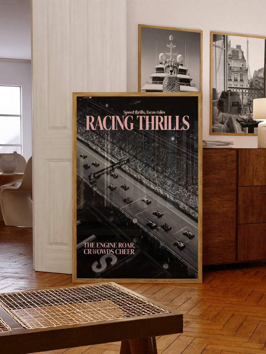 front framed view of Vintage motorsport wall art showing racing cars on a track with grandstand crowd, black and white photo styling and pale pink RACING THRILLS typography.
