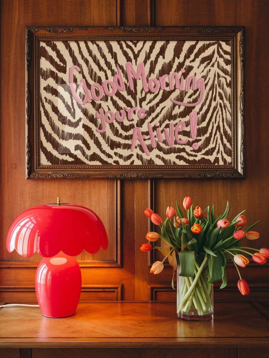 Pink motivational typography on zebra print