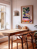 Modern plant and book still life canvas above rustic dining table