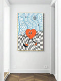 Modern orange heart canvas poster styled in a bright living room