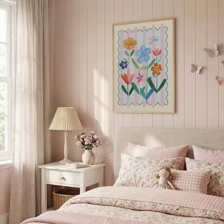 Pastel floral striped poster above pink cottagecore bed with lamp