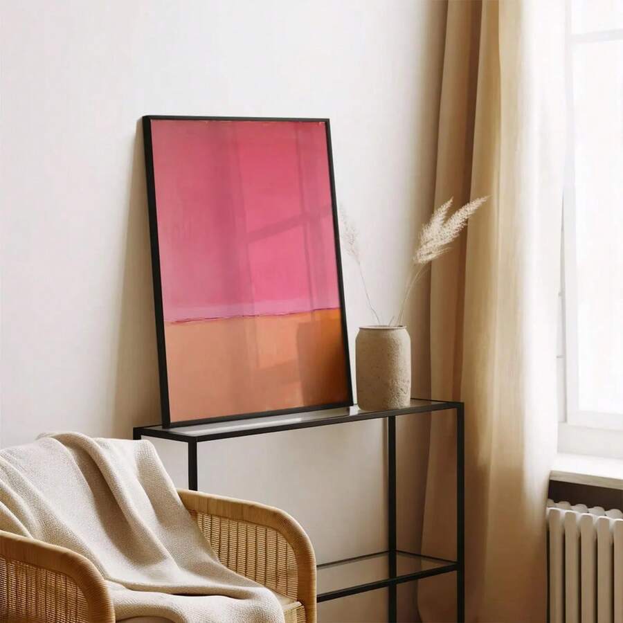 Red and pink abstract canvas wall art in black frame