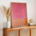 Minimalist pink orange canvas print above console table