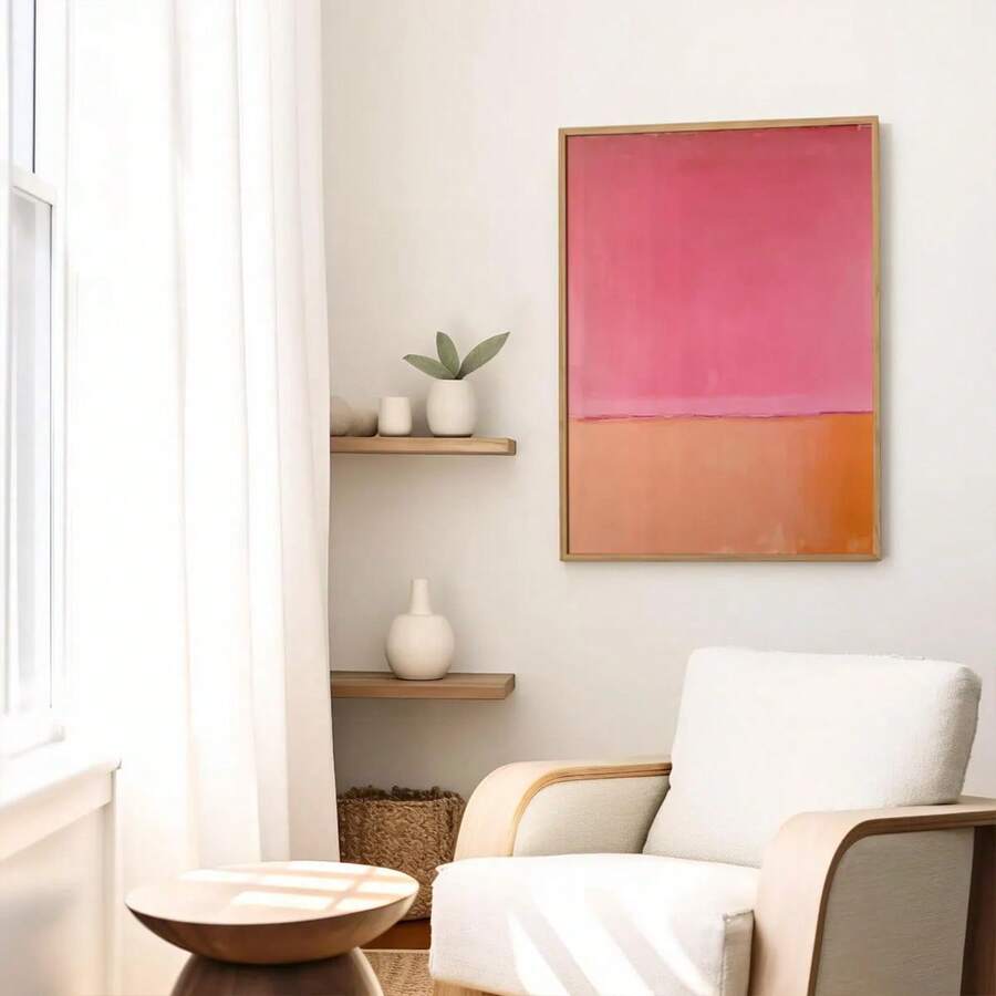 Red and pink abstract canvas wall art in black frame