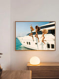 Retro yacht scene canvas wall art with stylish bikini girls